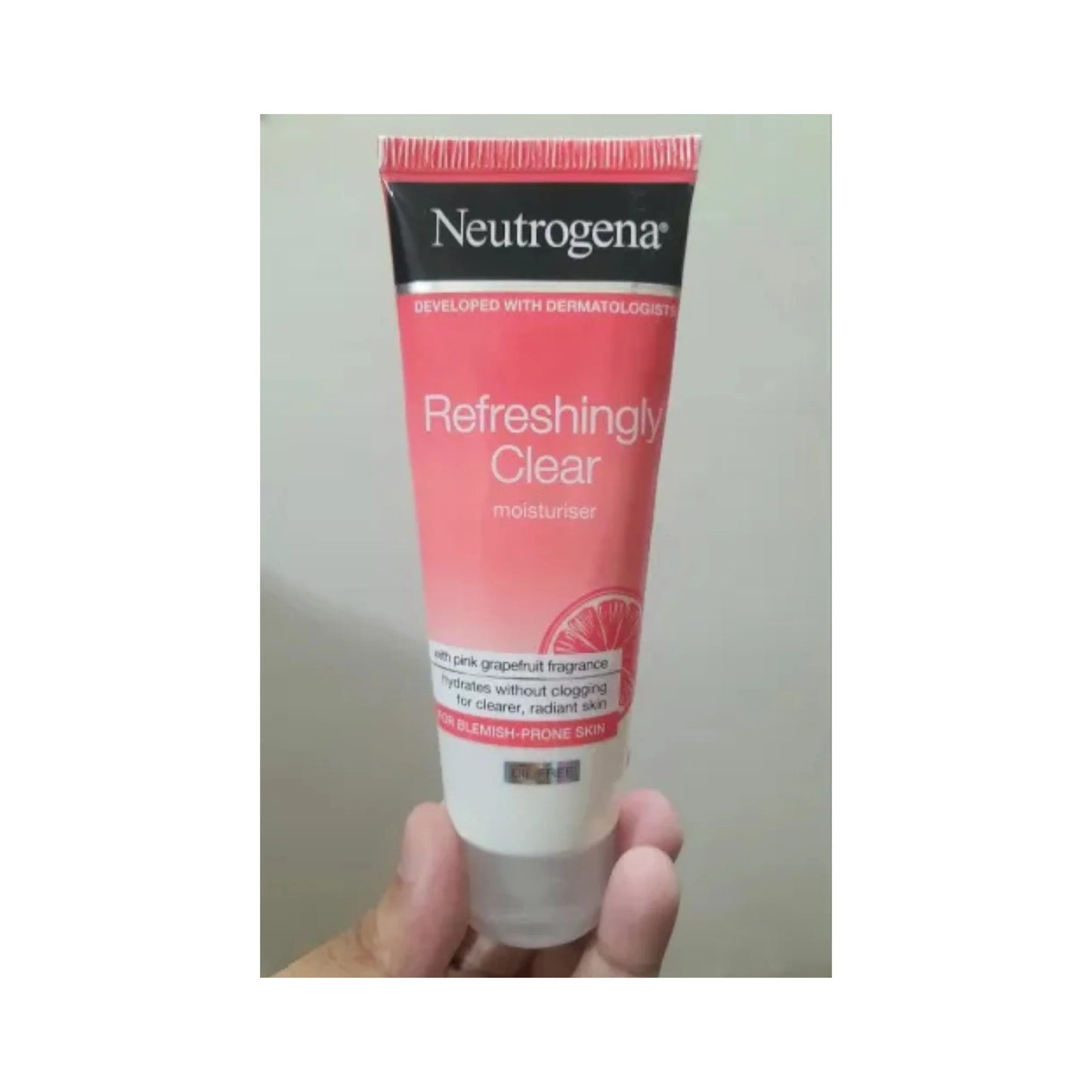 Neutrogena Clear and Radiant Oil Free Moisturizer with Pink Grapefruit Fragrance for Dry Skin 50ml
